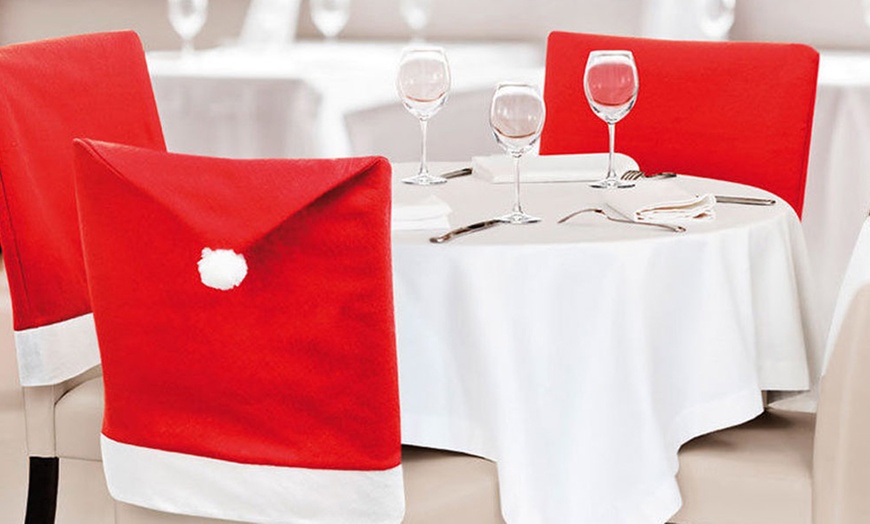 Image 1: Christmas Santa Claus Hat Design Dining Chair Slipcovers Chair Back Covers