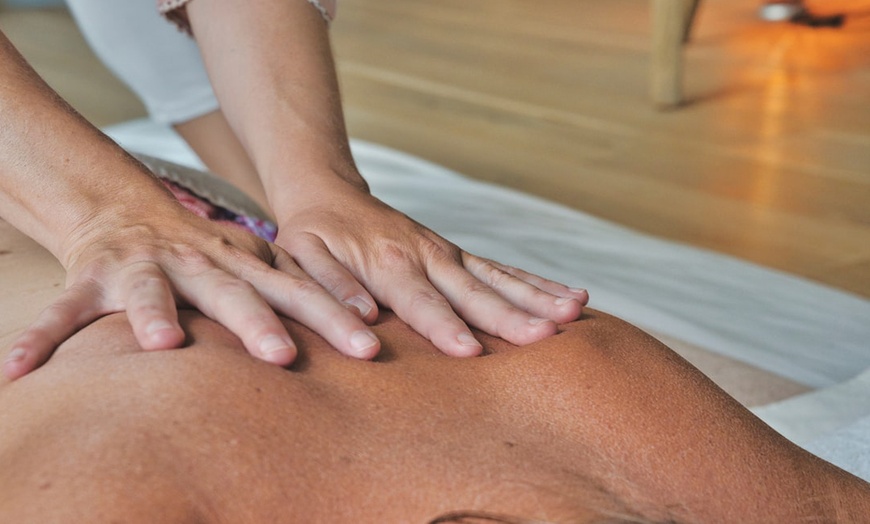 Image 2: Consultation, X-Rays, Two Adjustments, and Optional Exam & More