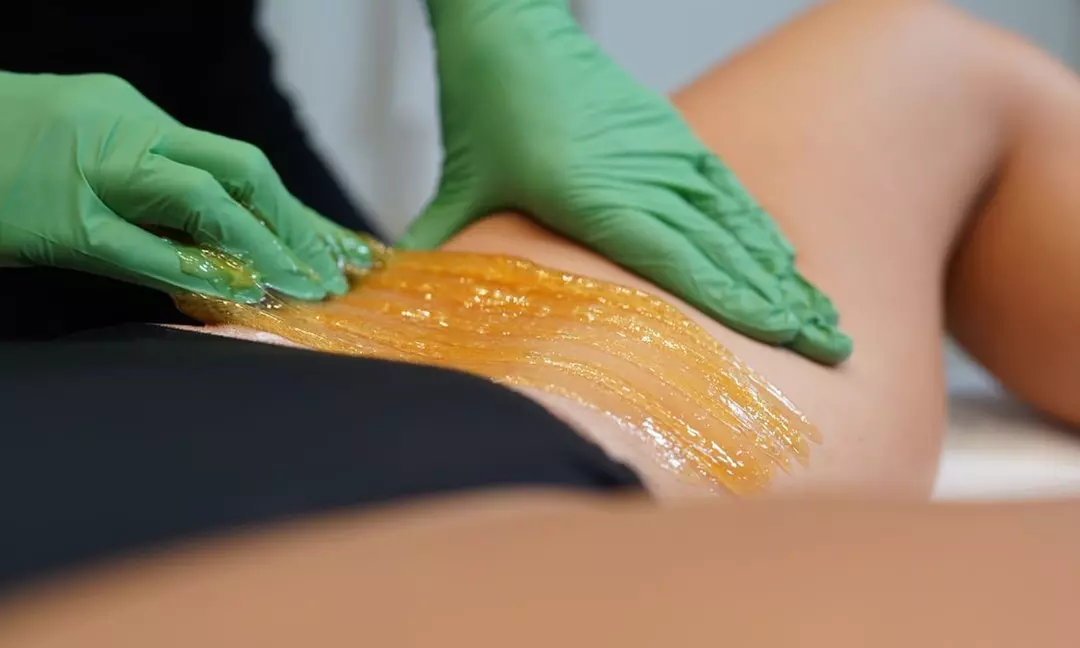 1 or 5 Brazilian/Bikini Wax Sessions and Lower Leg Wax (Both Legs) at Reveille