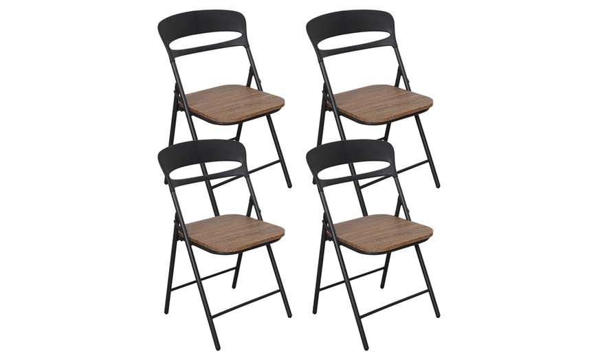 Image 2: Juego de 4 sillas plegables de metal con asiento de madera