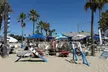 Beachside Fun: Sunbed Lounges, Paddle Board Adventures/More @Monty’s Dog Beach & Bar - Long Beach(Up to 30% Off) - Second Medium