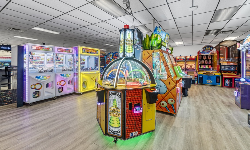 Image 4: Discounted Arcade Games Credits for Nonstop Fun at Strike Zone Alleys
