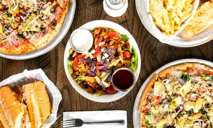 $20 Worth of Food and Drink or Cheese Bread, Pizzas, Dessert, and Soda