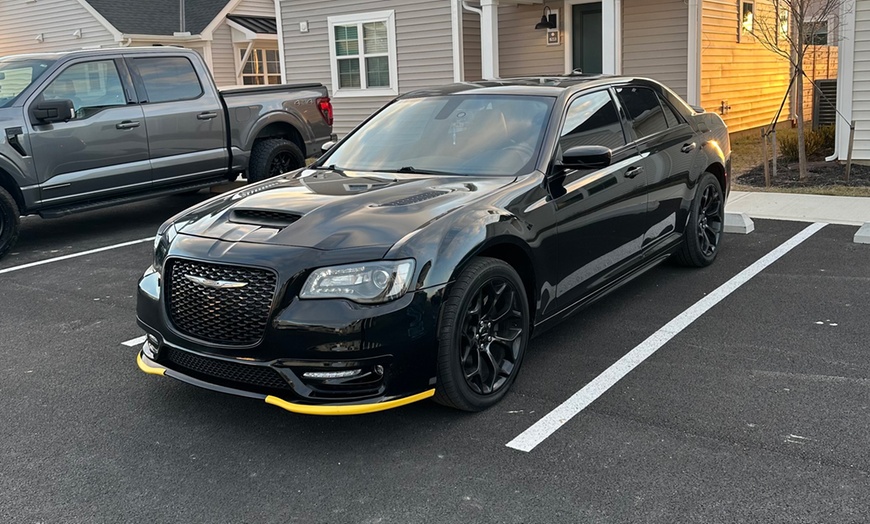 Image 4: Revitalize Your Ride with Quick Wash and Wax Options