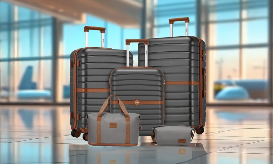 Image 1: Ensemble valise, sac de voyage et pochette gris et marron