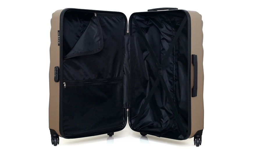 Image 24: Valise en coque rigide de la marque Wave Paris et Hero