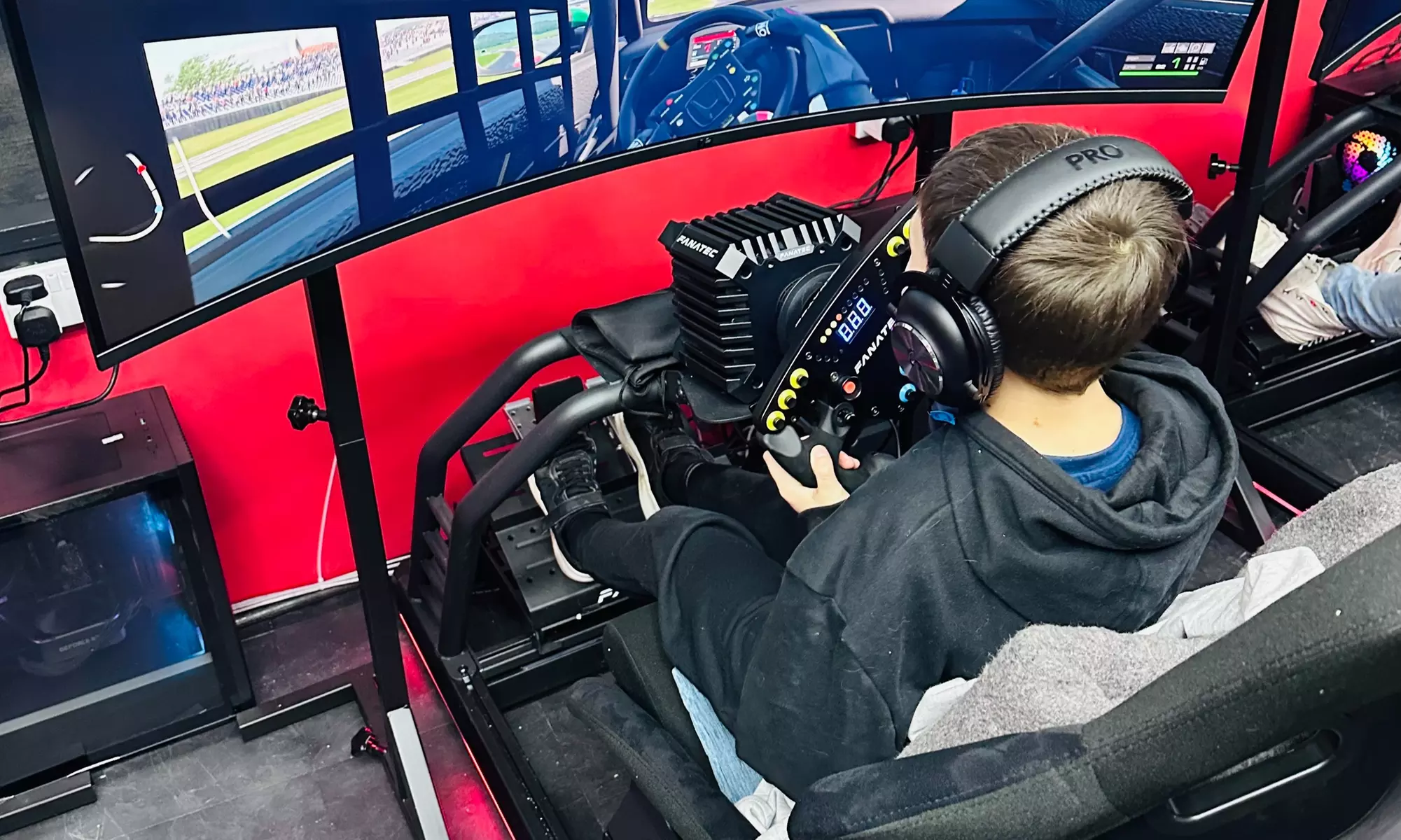 Gather with 30 or 60 Min Racing Simulation Experience for 1, 2 or 4