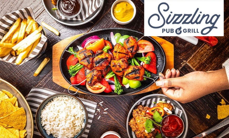 Image 1: Skillets and Small Plates at ⭑★ Sizzling Pub & Grill ★⭑