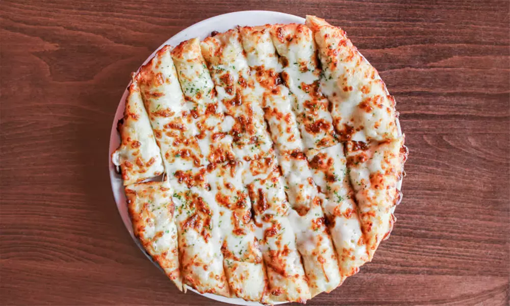$25,$50, or $100 Spend on Food & Drinks or Choice of Pizza + Toppings