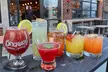 2 or 4 Cocktails or 16 oz Beers & 2 or 4 1-L Bottles of Vodka to Take Home for 2 or 4 People (Up to 53% Off) - Second Medium