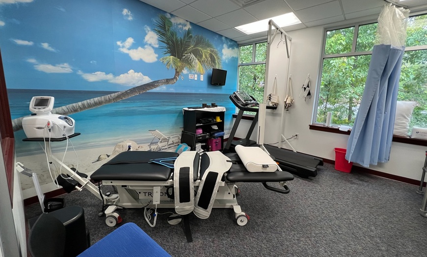 Image 2: 60 or 90-Minute Massage with Laser Therapy or Spinal Decompression