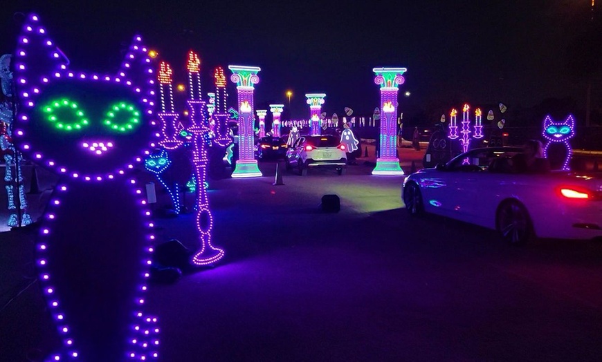 Image 4: Enchanted Lights: A Mile-Long Halloween Themed Drive-Thru Light Show