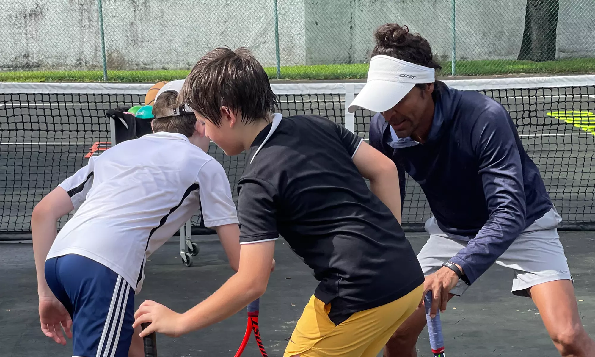 Ace Your Game with a Private Tennis Lesson for Up to Four