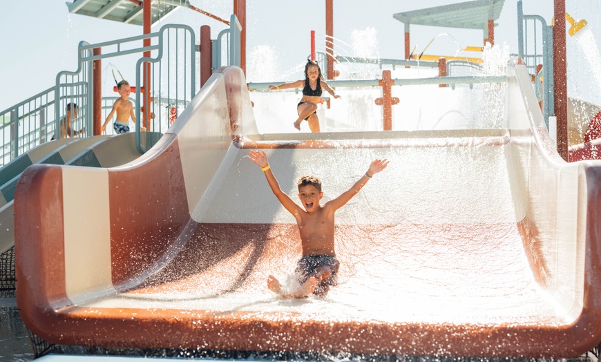 Image 10: Combo Day Pass: Water Slides, Splash Pad & Obstacle Course Access
