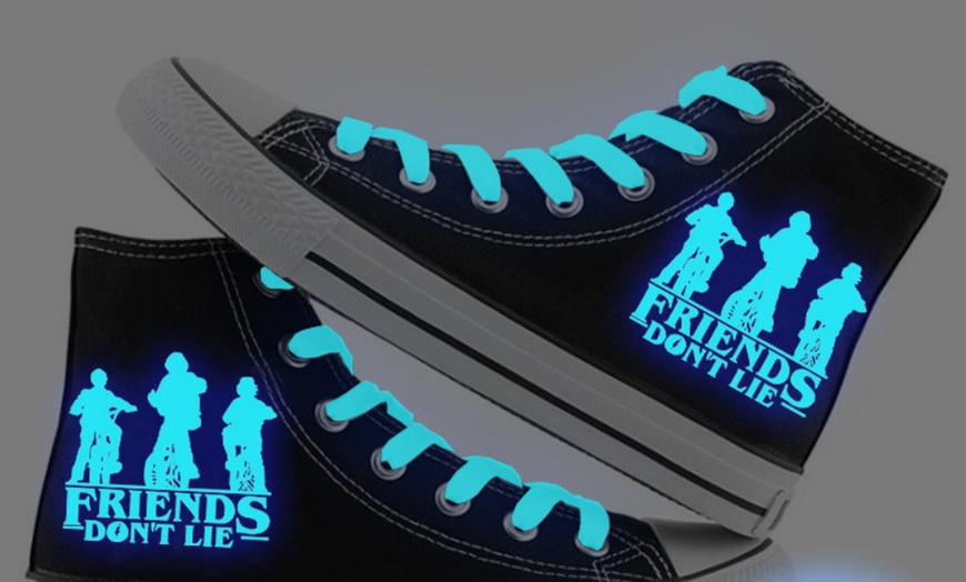 Image 9: Stranger Things Inspired Glow-in-the-Dark High-Top Trainers