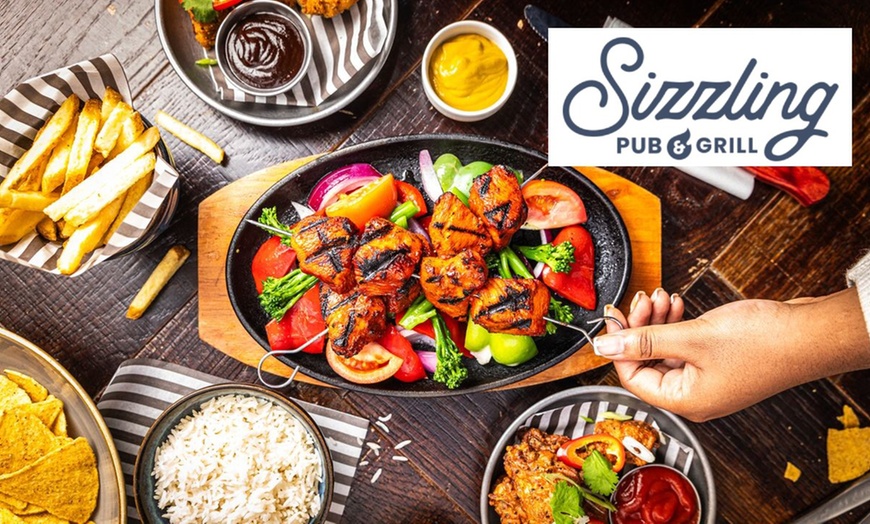 Image 1: Skillets and Small Plates at ⭑★ Sizzling Pub & Grill ★⭑