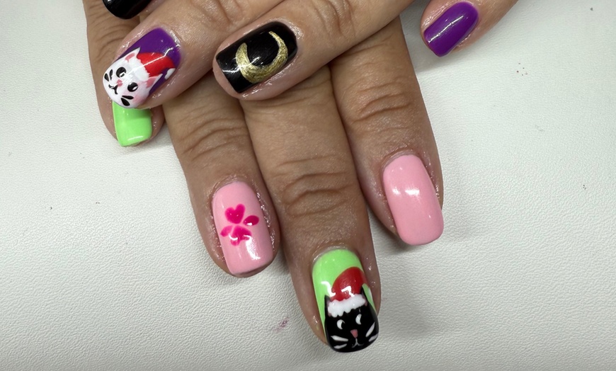 Image 2: Revitalize with a Basic Pedicure or Gel Polish Manicure