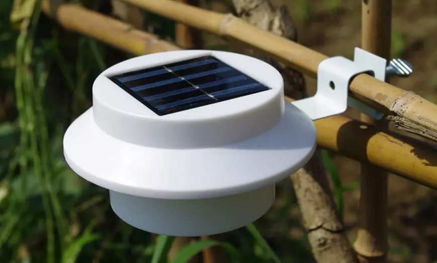 Image 6: Brighten Your Space: 2, 4, or 8 Solar Fence Gutter Lights: White/Black