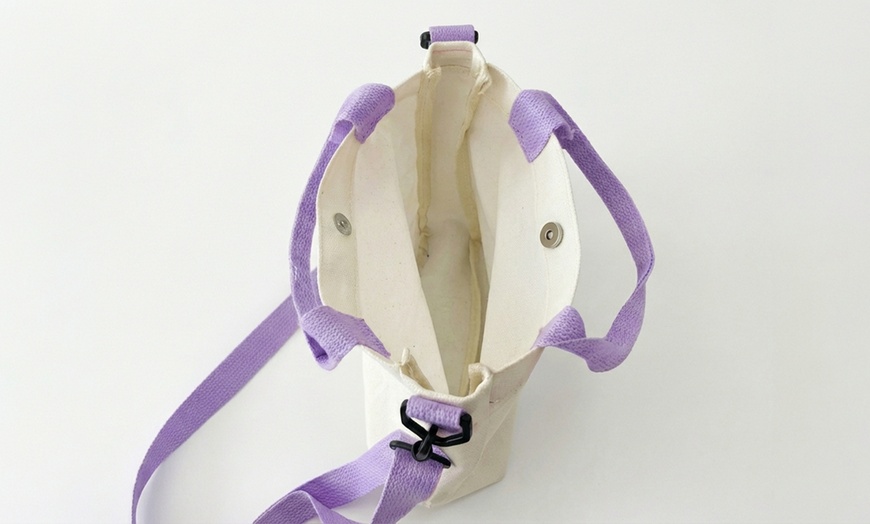 Image 4: Lightweight Purple Canvas Bag with Playful Design