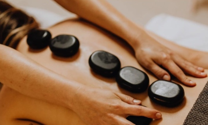 Image 4: Experience a 60-Minute Thai Massage with Hot Stones or Essential Oils