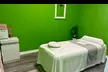Get 50 or 60-minute Deluxe Body Massage, Single or Couple, Combo Massage w/ Hot Stone Treatment - Up to 50% Off - Second Medium