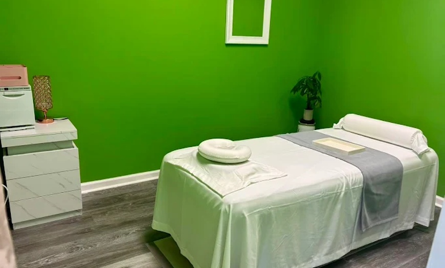 Image 2: Get 50 or 60-minute Deluxe Body Massage, Single or Couple, Combo Massage w/ Hot Stone Treatment - Up to 50% Off 