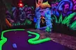 Family Fun Awaits with 12 Holes of Glow in the Dark Mini Golf with 3D Artwork! - Second Medium