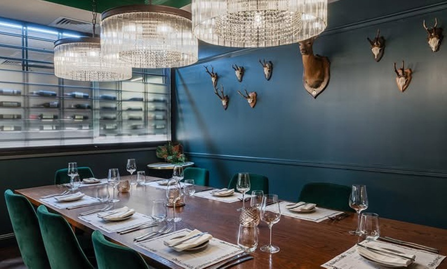 Image 11: Enjoy Dry Aged Sirloin with Sides and Wine for Two or Four Guests