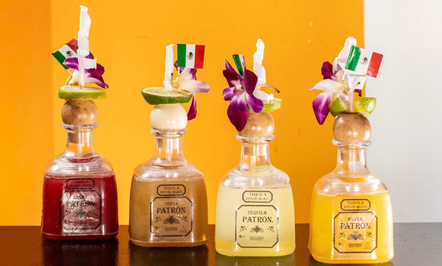 Image 25: Vibrant Rooftop Dining: Choose Meals, Margaritas, or Dining Credit