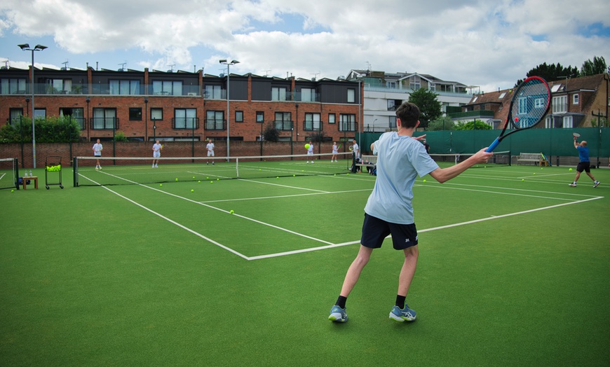 Image 5: Elevate Your Tennis Skills: Play with a Pro Top 150 or 1500 Clinic