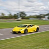 Image 1: 3-Lap Premium Racetrack Driving or Ride-Along Experience for 1 or 2 (Multiple Dates Available)