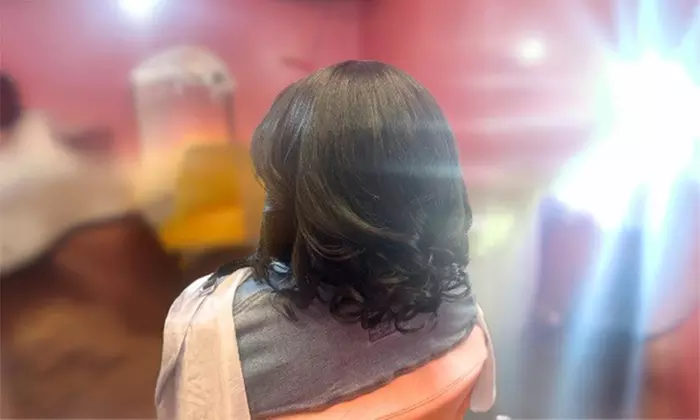 Achieve Silk Press Service for Smooth and Shiny Hair