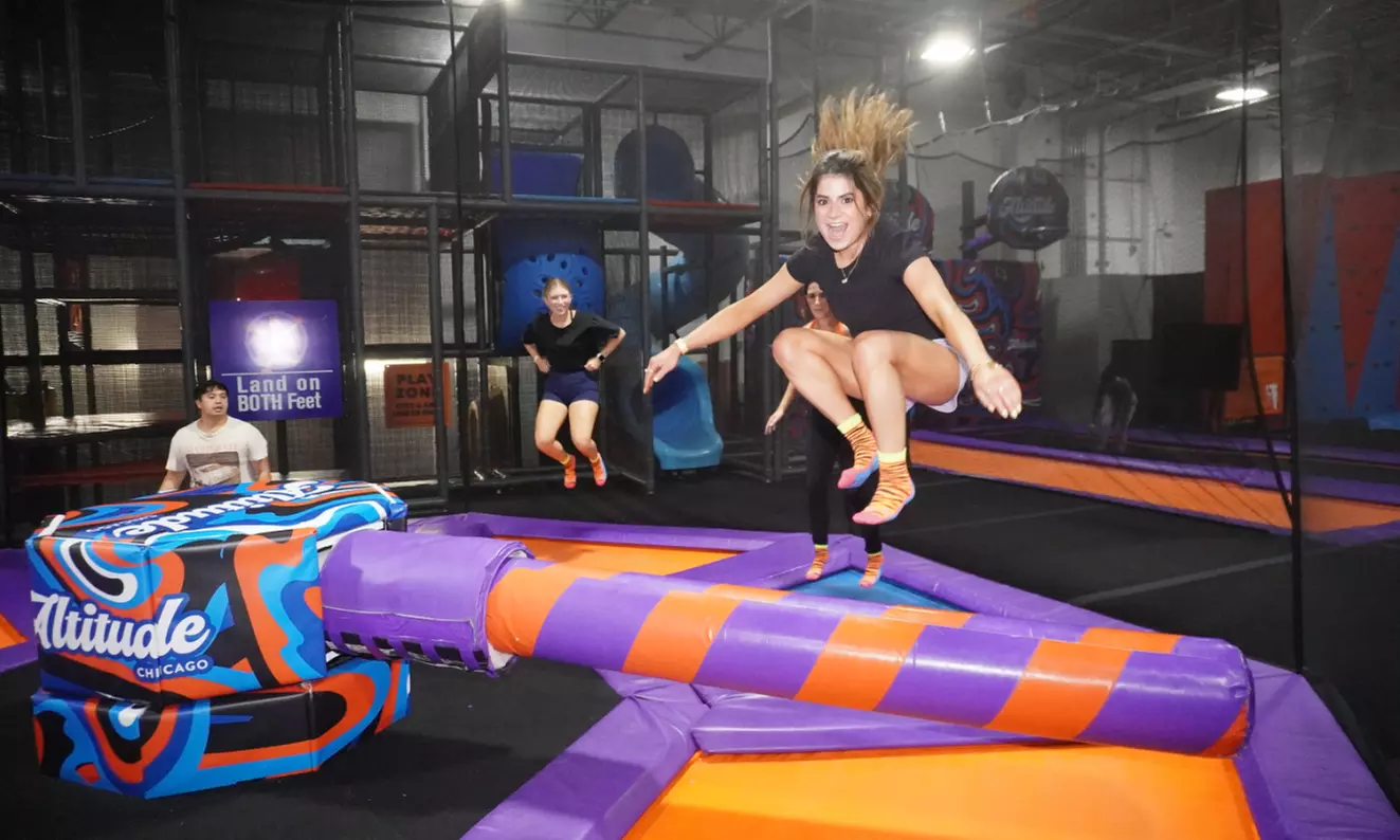 Entry for One to Adults Night at the Trampoline Park: Jump and Drink like a Kid and Adult (Up to 25% Off) - Primary Image