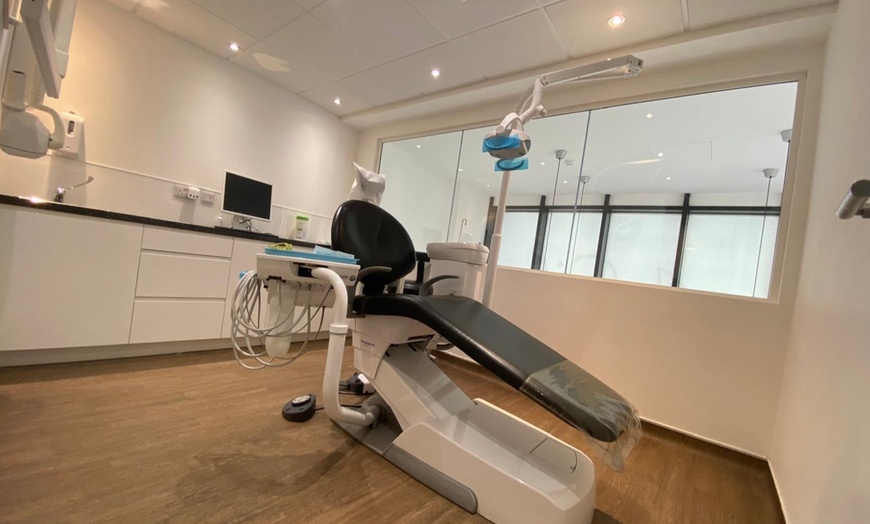 Image 3: Teeth Whitening treatment with dental exam,air polish & home whitening