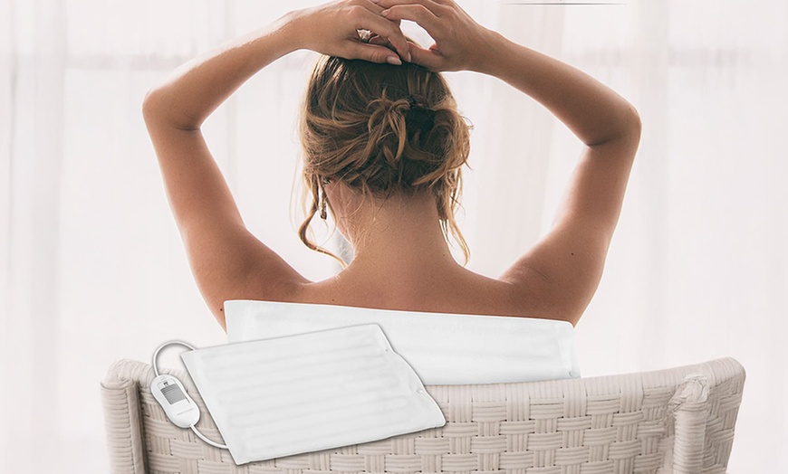 Image 9: Restez au chaud avec un coussin ou une couverture chauffante