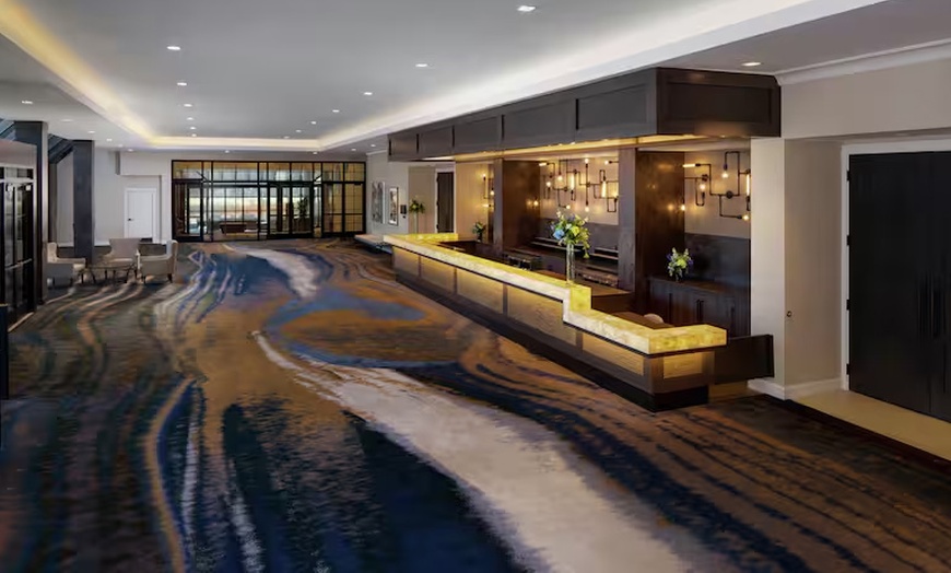 Image 13: Modern 4-Star Stay w/ Pool, Dining, & SNHU Arena Convenience