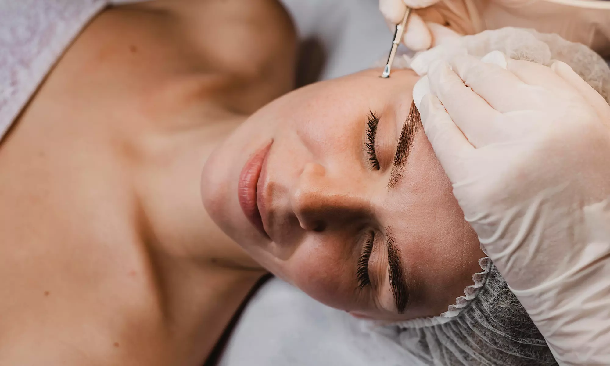 Reveal Glowing Skin with 1 or 2 Dermaplane Treatments w/Red Light Therapy at FaceLine Aesthetics (Up to 40% Off) - Primary Image