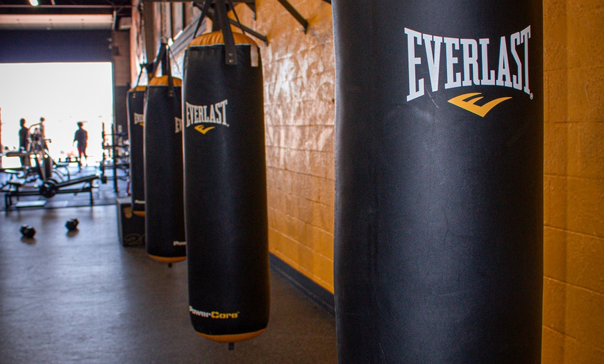 Image 2: One or Two Months of Boot Camp, Boxercise, or Body Sculpt Classes at Quick Fitness (Up to 57% Off)