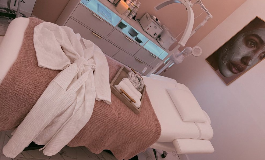 Image 2:  50-Min Swedish, Deep Tissue, Hot Stone Massage, Facial & More 