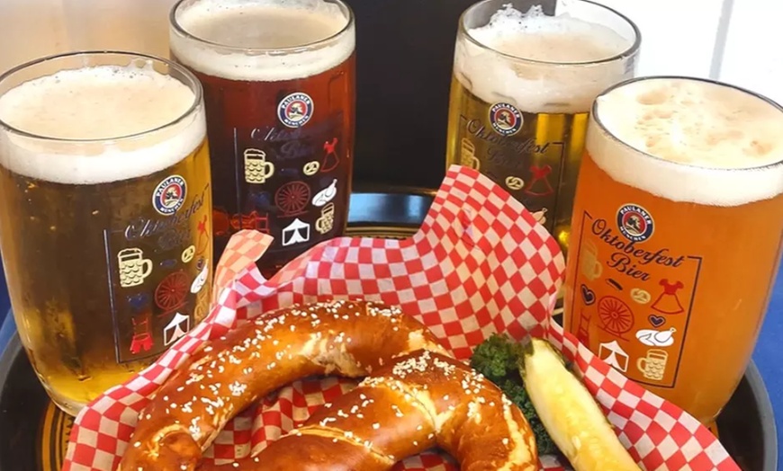 Image 1: Indulge in a German Bier Sampler with Pretzels for Two People at Helga's German Restaurant and Deli, up to 32% off