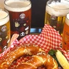 Image 1: Indulge in a German Bier Sampler with Pretzels for Two People at Helga's German Restaurant and Deli, up to 32% off