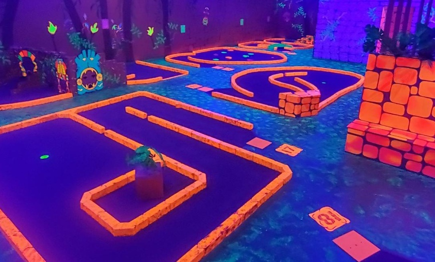 Image 1: Light Up the Fun with Blacklight Minigolf Rounds and Arcade Games!