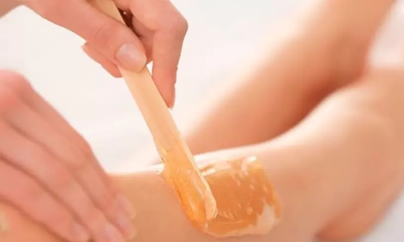 1 or 5 Brazilian/Bikini Wax Sessions and Lower Leg Wax (Both Legs) at Reveille - Second Medium