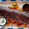 Image 1: Glasierte Babyback Ribs mit Löffelpommes & Saucen für 1 - 4 Person