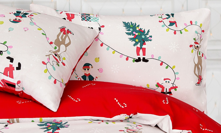 Image 7: Santa Print Duvet Set in Various Sizes