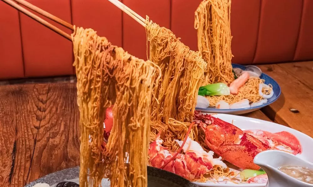 Savor $50 Dining Credit or Dinner with Cocktails for Two or Four