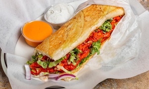 Savor the Inclusive flavors at Gaia Masala and Burger w/ $20 or $40 towards Food & Drink (Up to 33% Off)