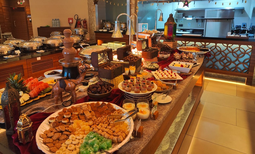 Image 1: 4* Iftar Buffet and Karak Tea: Child (AED 40), Adult (AED 89)