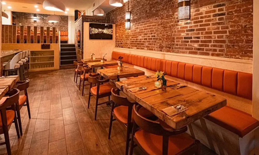 Savor $50 Dining Credit or Dinner with Cocktails for Two or Four