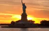 Statue of Liberty & NYC Sky Line Sunset Cruise  for One, Two, or Four People at Statuewalks (Up to   39% Off)